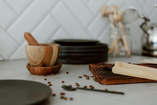 Coffee beans and cooking accessories on a kitchen counter
